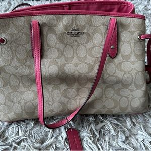 Coach tote in signature canvas with pink.
